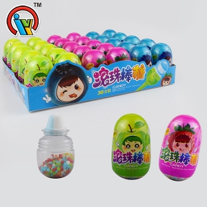 bonbons pressés sucette avec mini bonbons fruités