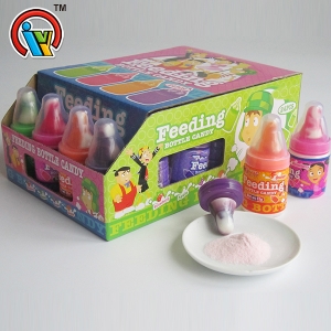 bonbons sucette avec des bonbons en poudre dans un biberon