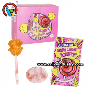 sucette à fluorescence rose avec des bonbons éclatants