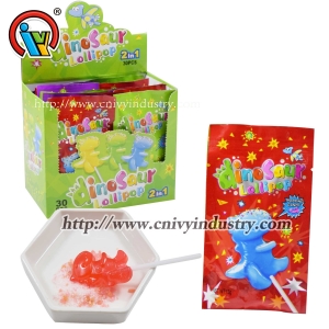 sucette de bonbons de dinosaure avec des bonbons éclatants
