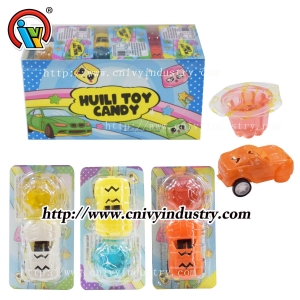 Bonbons à la confiture de fruits avec jouet de voiture à tirer